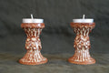 Brown and White Carved Candlesticks